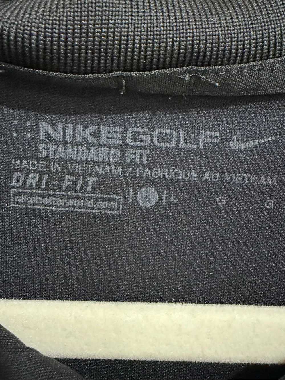 Nike Black Polo Shirt with White Swoosh